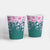 картонени чаши с розови цветя в зелено
