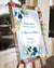 Добре дошли на сватбеното тържество, табела със син фон и сини цветя, табела за абитуриентски бал, табела "добре дошли", табела за посрещане на гости